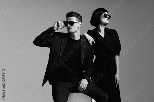 man and woman in gas masks