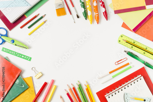 Colourful school supplies on a flat surface