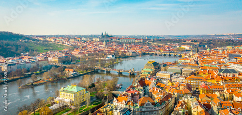 Aerial Panoramic View of Prague City above the River, Bridges and Old Town at Sunset Time