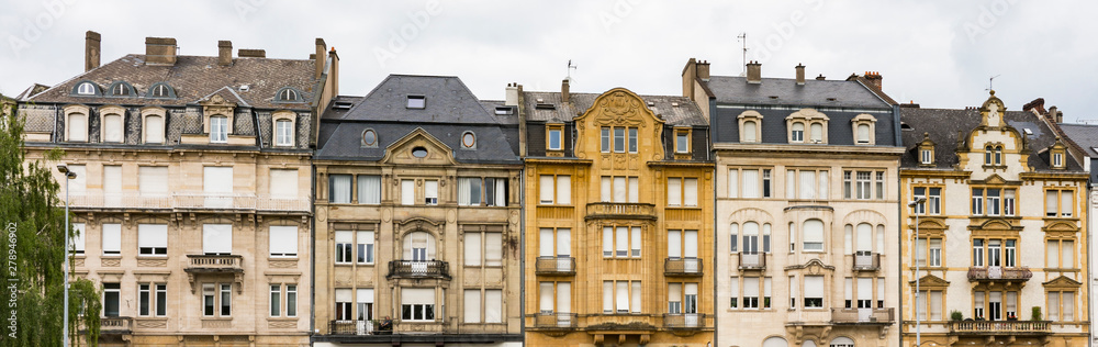 yellow building with apartments in Thionville, France