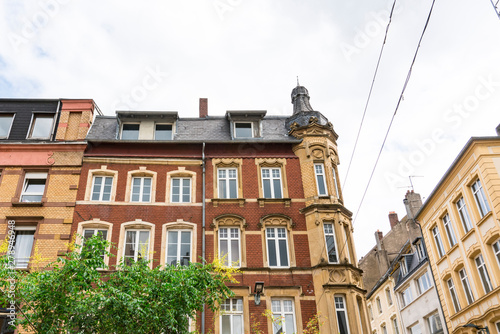 yellow orange building with apartments in Thionville, France