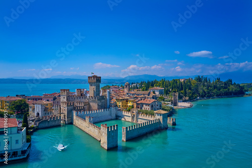 Aerial photography with drone, Rocca Scaligera Castle in Sirmione. Garda, Italy.