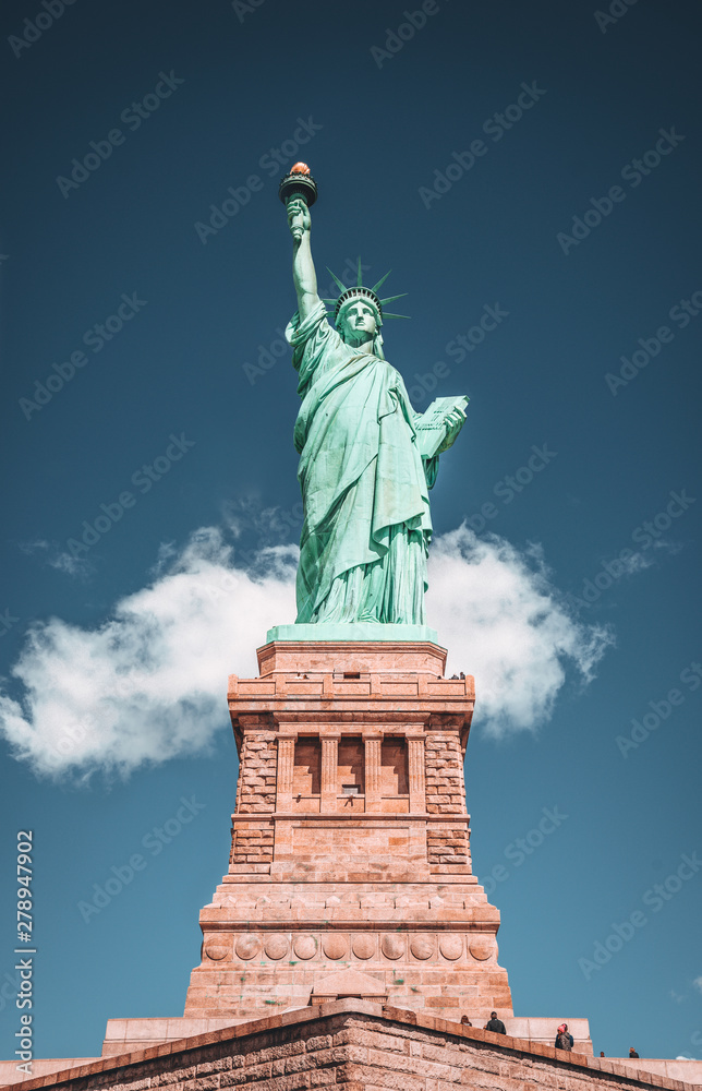 Geometric Front View of the Statue of Liberty with cloud on blue sky background