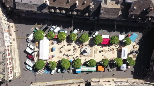 Aerial vertical view over place Henri Cordesse with trees and people France Marvejols photo