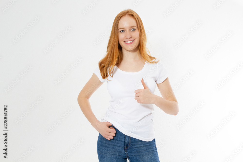Beautiful red hair girl show like sign on a white t-shirt isolated. Pretty smile red head woman in tshirt mock up, blank. Beautiful red hair girl show like sign on a white t-shirt isolated. Pretty smile red head woman in tshirt mock up, blank.
