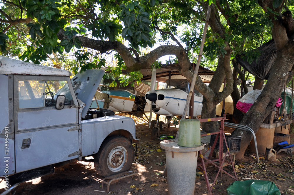abandoned old land rover and aeroplane africa 
