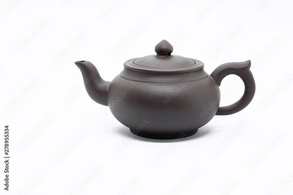 traditional Chinese teapot made of Issinclay clay, tea ceremonion, isolated on a white background