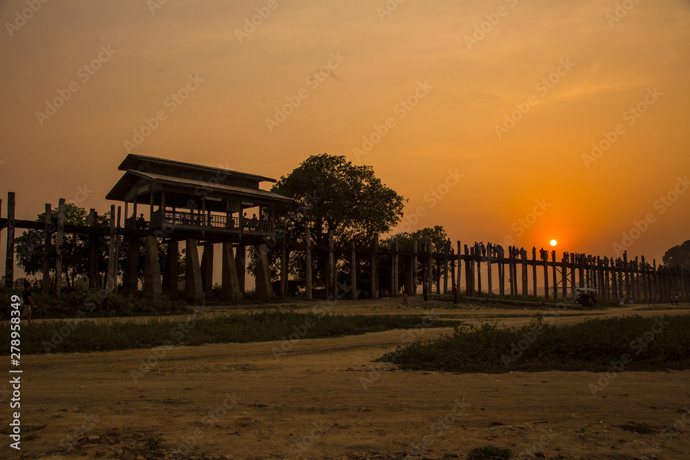 The beautiful sunset at the U-Bein bridge in Myanmar