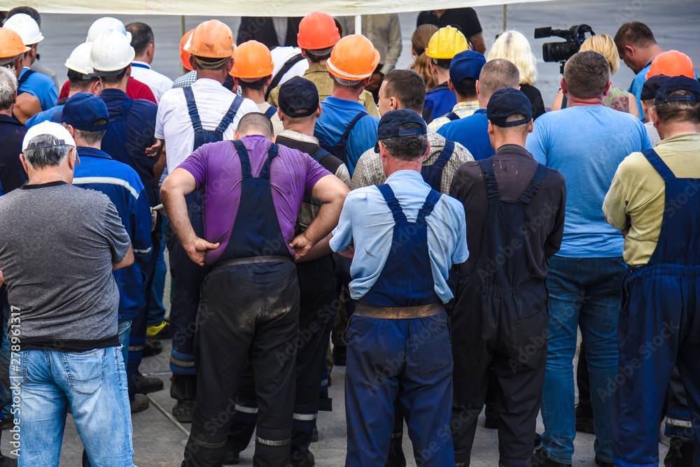 workers at the meeting, strike