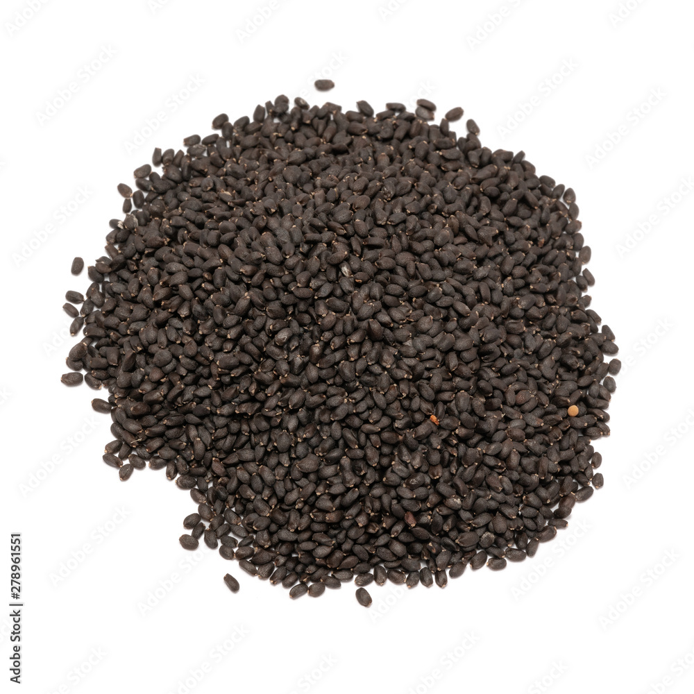 Basil seeds close up isolated on white background Basil seeds close up isolated on white background