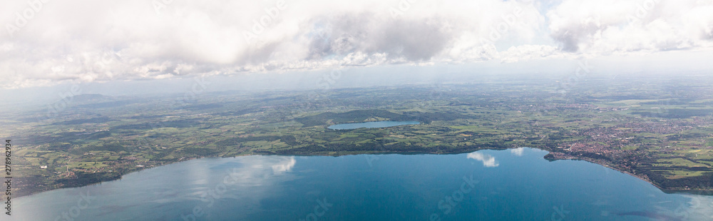 panoramic shot of aerial view of sea under blue sky with clouds in rome, italy