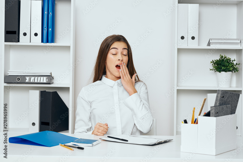 businesswoman talking on phone in office businesswoman talking on phone in office