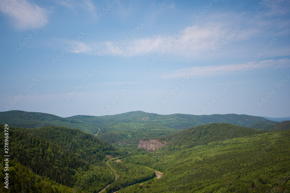 view of the Ural mountains in sunny weather from the mountain. a place for meditation, relaxation. rest for the soul
