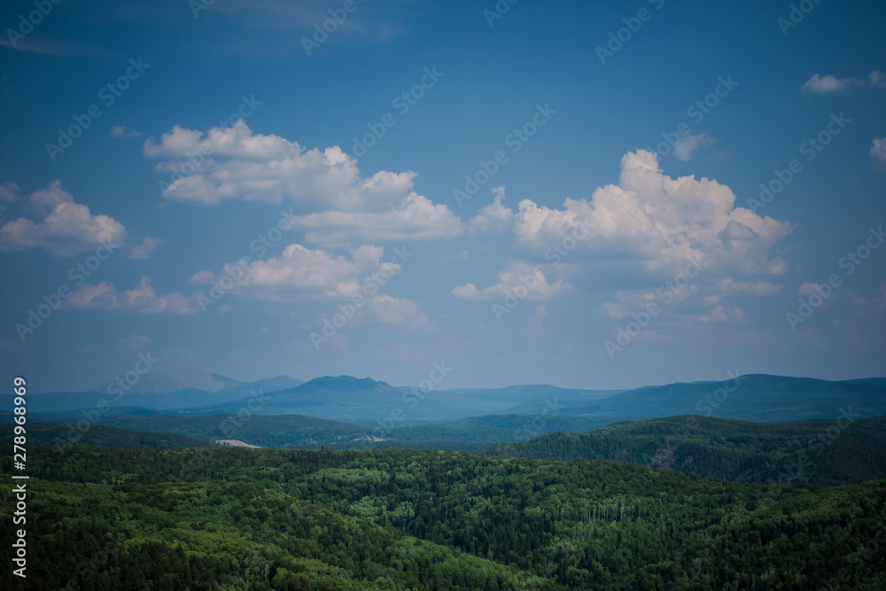 view of the Ural mountains in sunny weather from the mountain. rest for the soul. clear your mind.