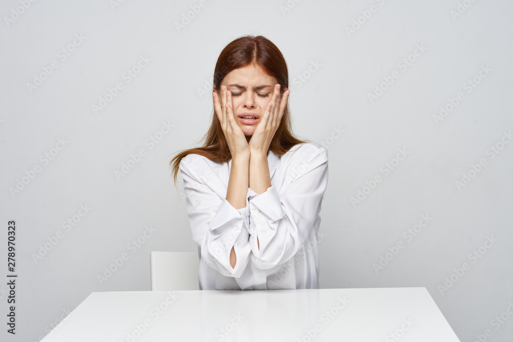 business woman sitting at desk with laptop business woman sitting at desk with laptop