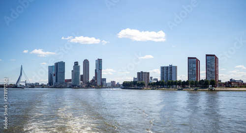 Cityscape and Erasmus bridge, sunny day. Rotterdam, Netherlands. © Rawf8