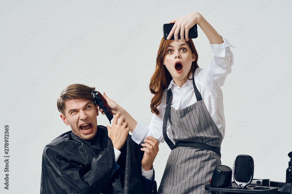 man and woman fighting over white background