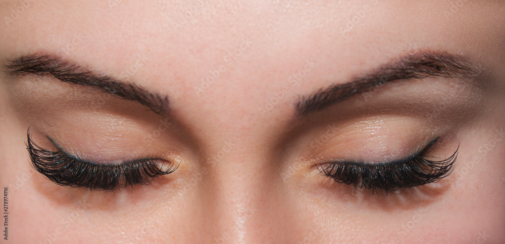 Obraz premium A beautiful woman with closed eyes. Close up shot