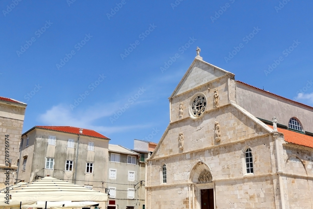 Historic Church of the Assumption on main square in town Pag, island Pag, Croatia. Historic Church of the Assumption on main square in town Pag, island Pag, Croatia.