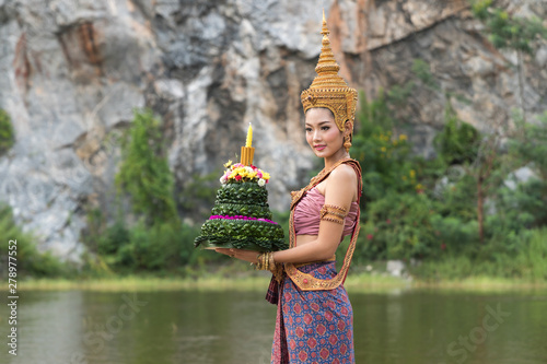 beautiful thai model wearing thai traditiomal loy kratong festival photo