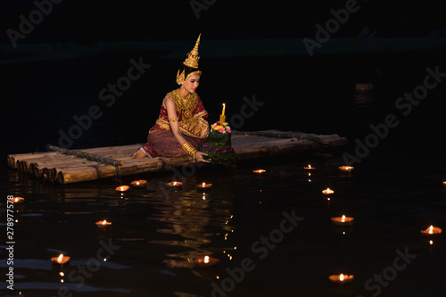 beautiful thai model wearing thai traditiomal loy kratong festival photo