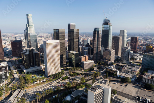 Afternoon aerial of freeway  streets  towers and buildings in sprawling downtown Los Angeles  California. 