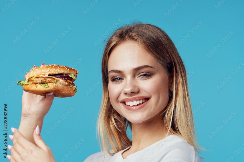 woman with hamburger