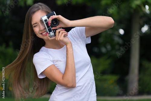 Portrait of a Woman Taking Pictures
