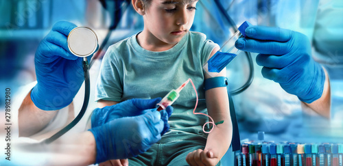 children health care concept Checkup pediatrician / pediatric medical diagnostic concept. Around child patient is the hand of a doctor with a stethoscope, two hands performing a blood test and a hand photo