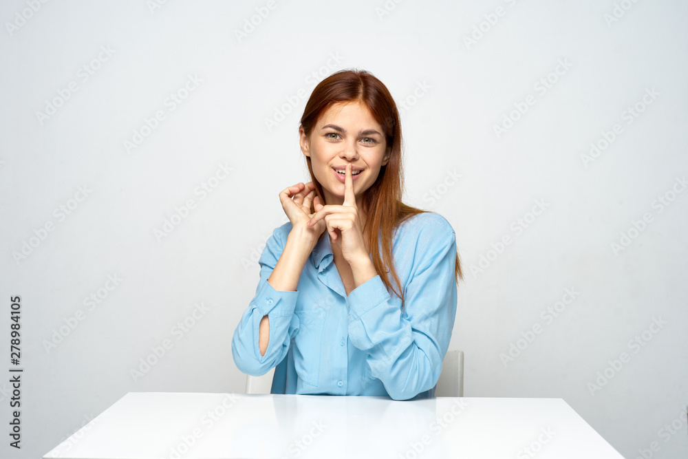 woman sitting on sofa with laptop and mobile phone woman sitting on sofa with laptop and mobile phone