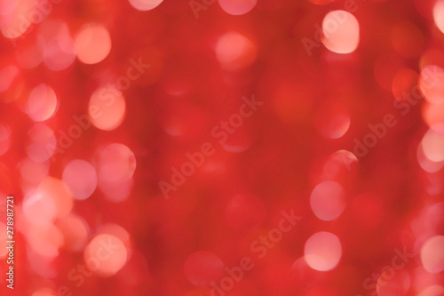 abstract bright bokeh background of coral color, space for text