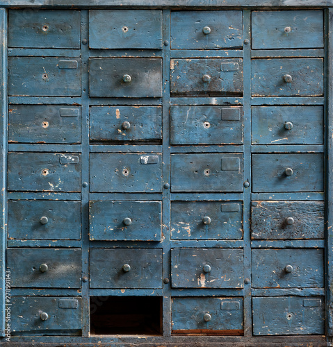 Old blue wooden cabinet with drawers