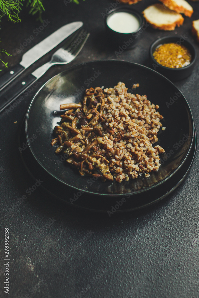 buckwheat porridge with mushrooms. food background. top view. copy space buckwheat porridge with mushrooms. food background. top view. copy space