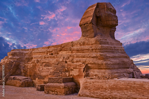 Sphinx against the backdrop of the great Egyptian pyramids. Africa  Giza Plateau. 