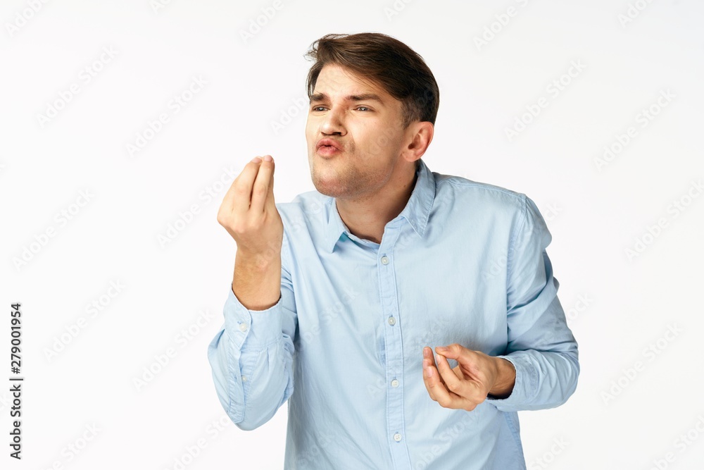 young man with thumbs up gesture isolated on white young man with thumbs up gesture isolated on white