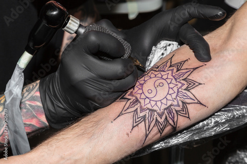 Canvas Print Tattoo in form of circular pattern on man's arm