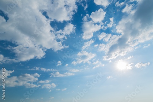 Fototapeta Naklejka Na Ścianę i Meble -  Blue Sky with Sun Shining and Clouds