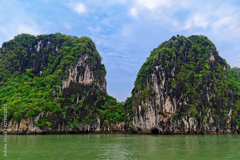 Green rocky islands in Ha Long bay, Vietnam
