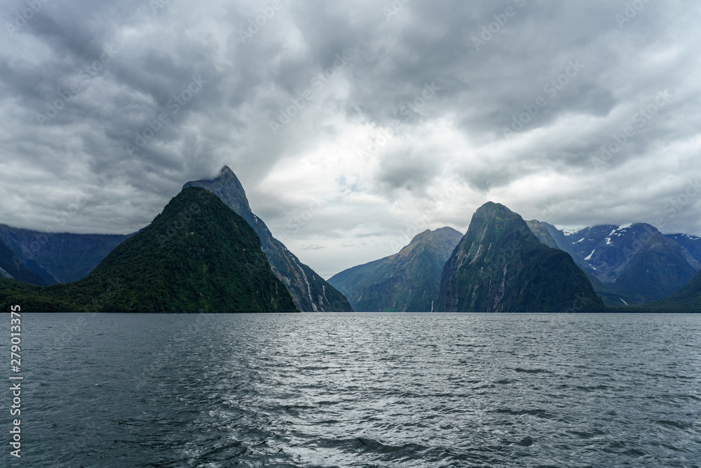 steep coast in the mountains at milford sound, fjordland, new zealand 4
