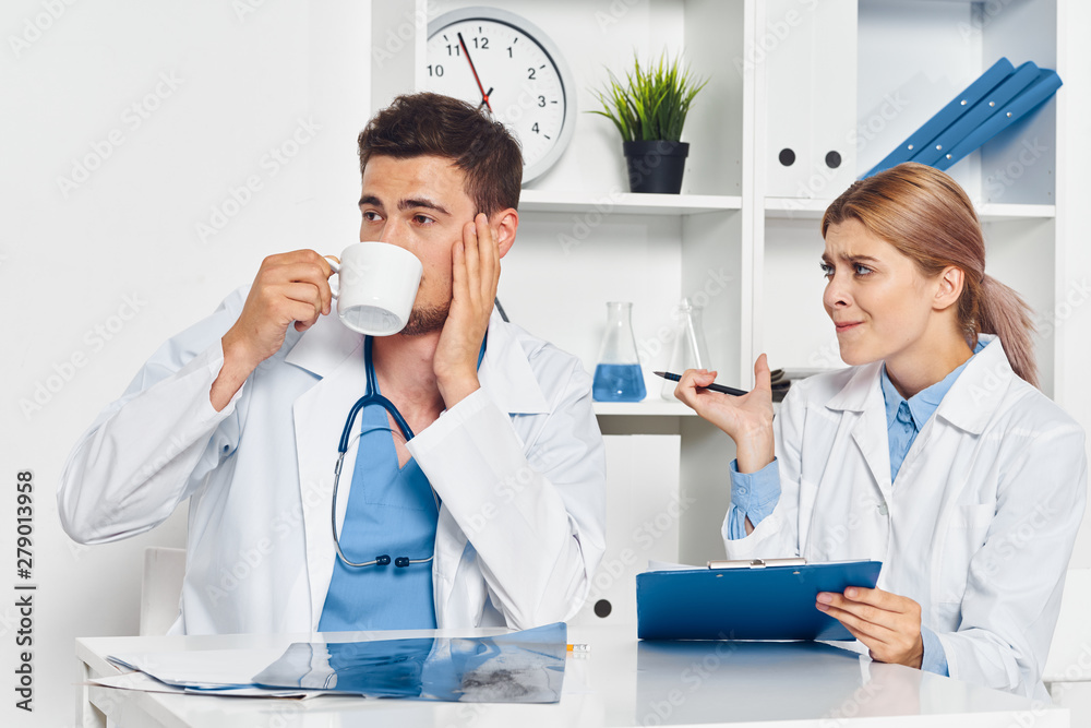 two scientists working in laboratory two scientists working in laboratory