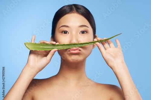 woman eating watermelon on white background