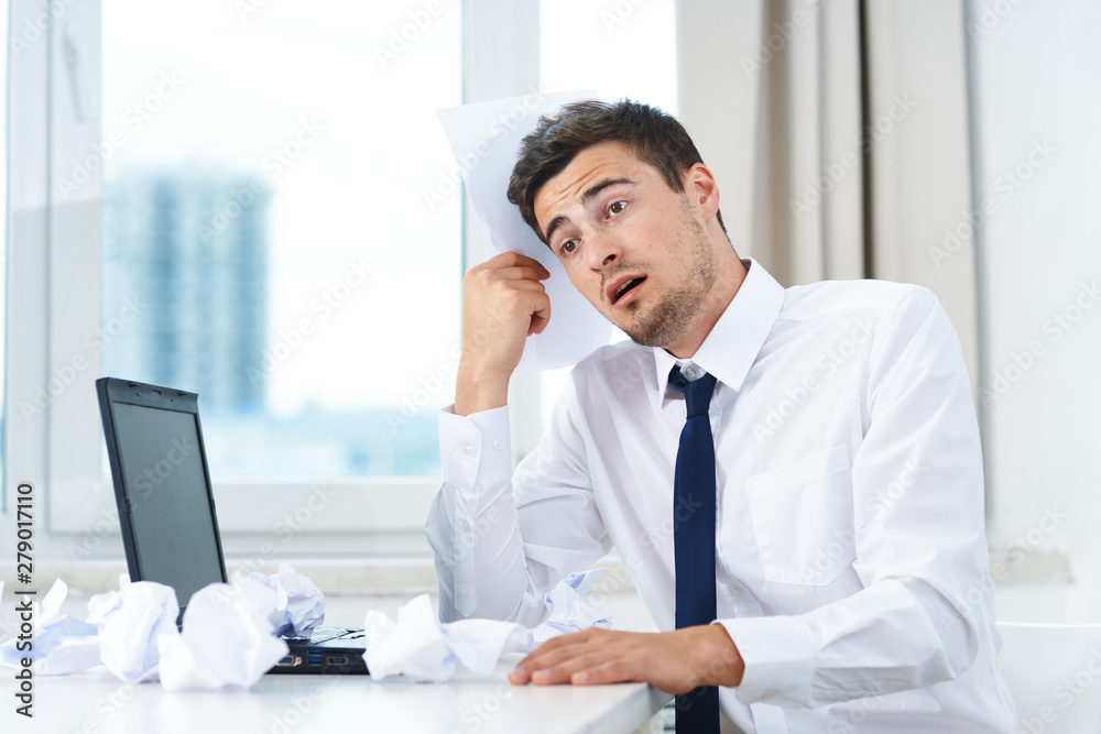 businessman working on his laptop in office