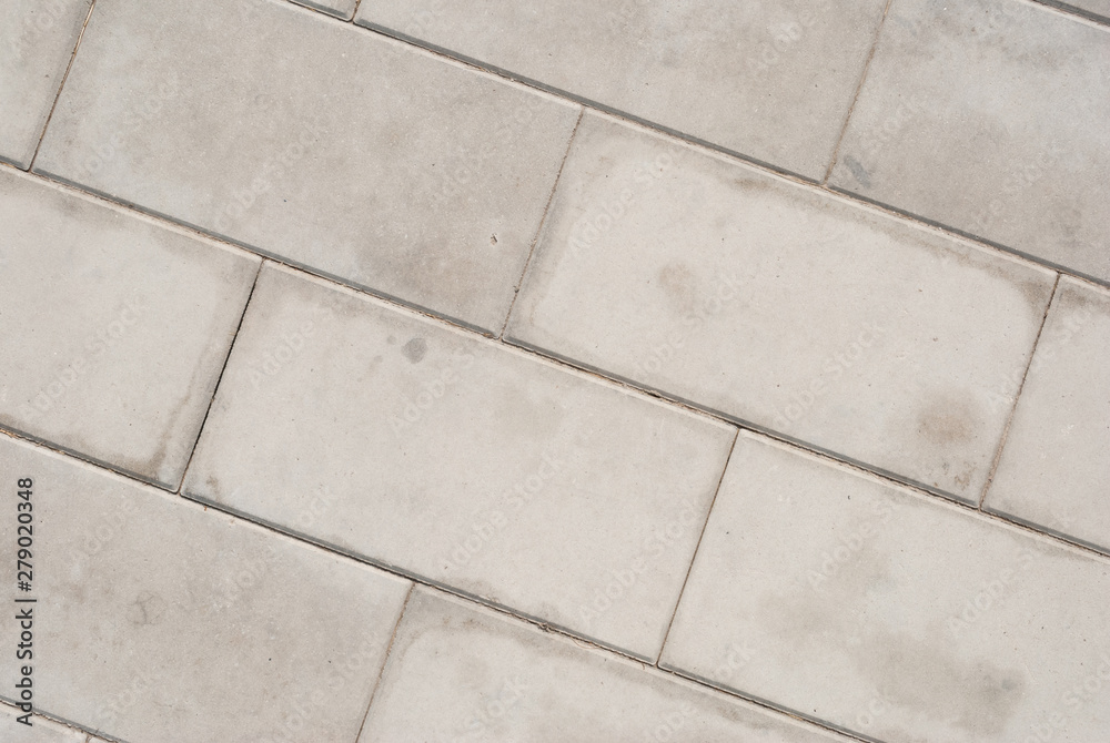 Obraz premium Brick pavement tile, top view. Light sidewalk, pavement texture