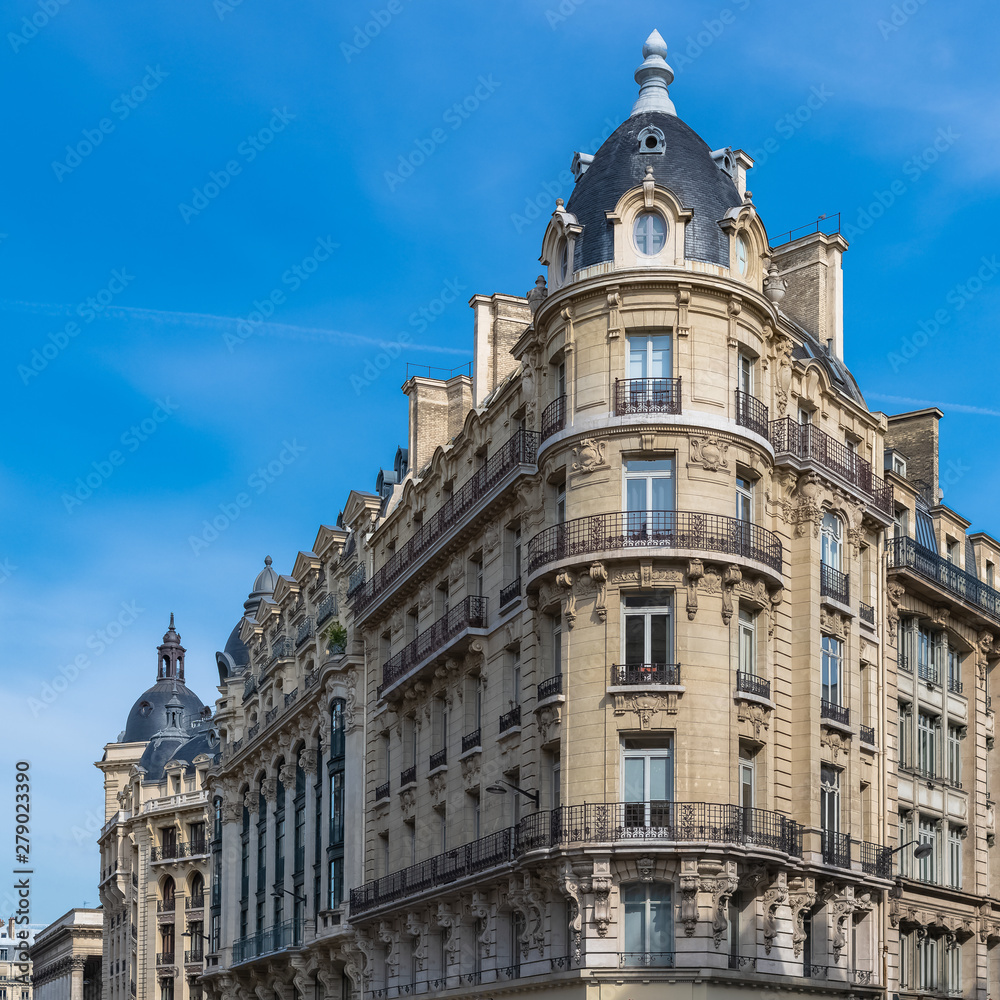 Paris, typical building, parisian facade and windows rue Reaumur
