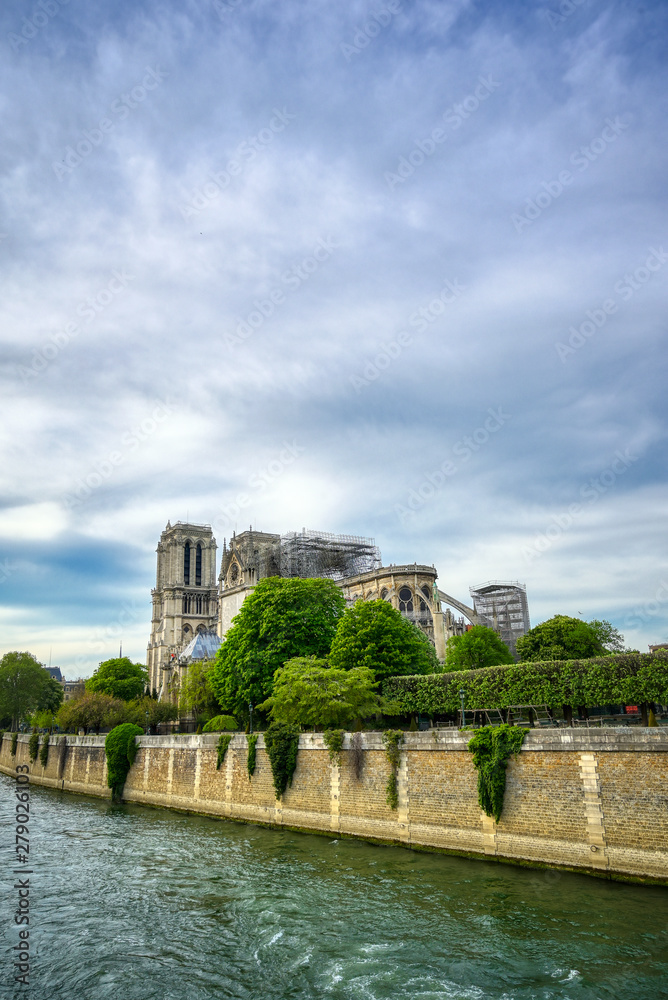 Notre Dame Cathedral on the Seine River in Paris, France after the fire on April 15, 2019.