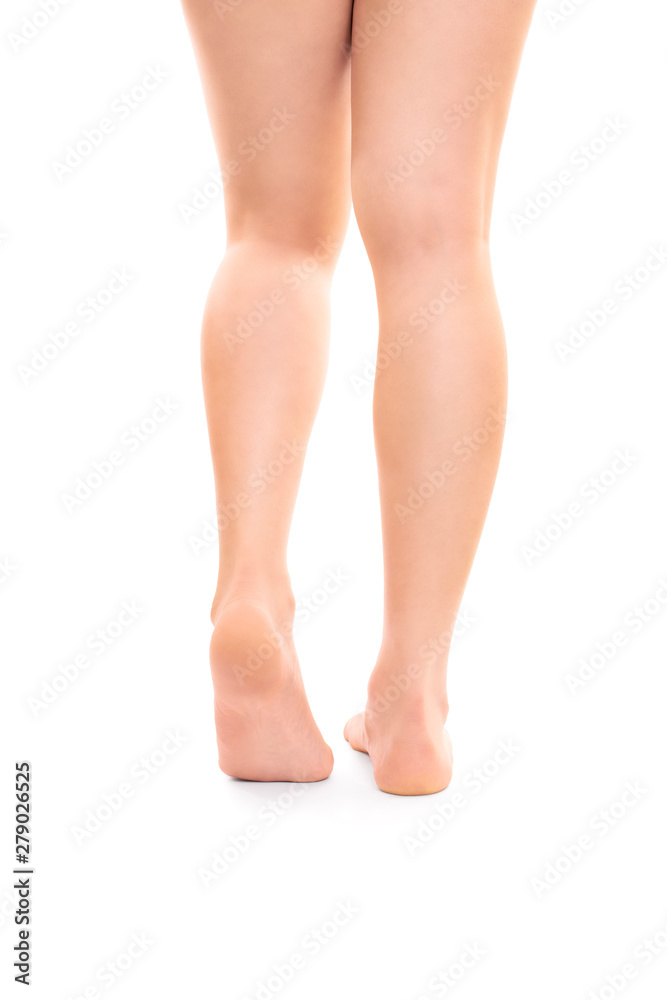 Naked female legs isolated on white background Naked female legs isolated on white background