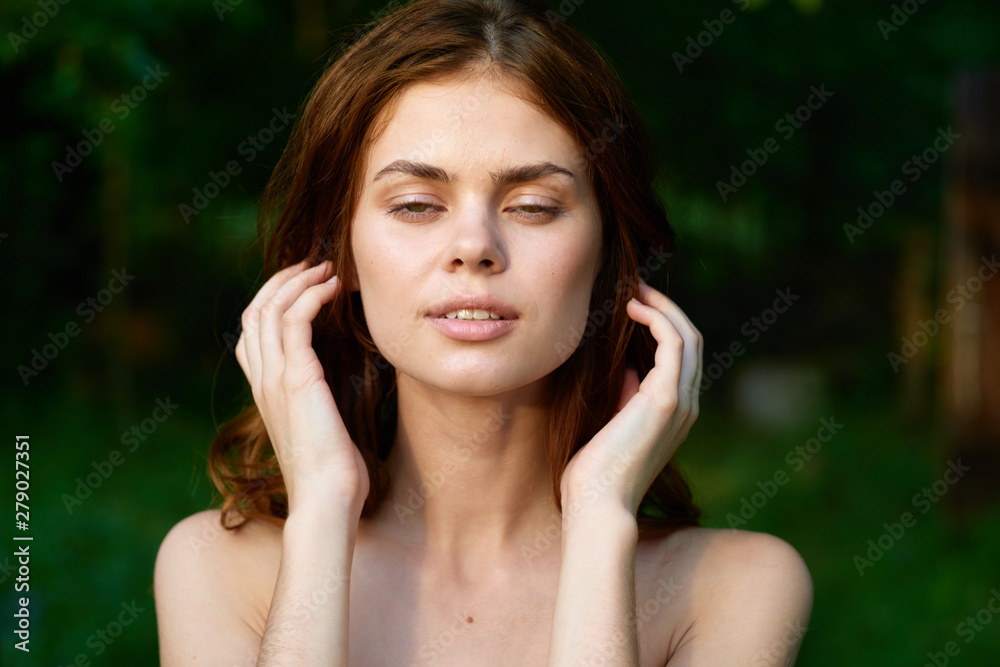 Fototapeta premium young woman talking on mobile phone