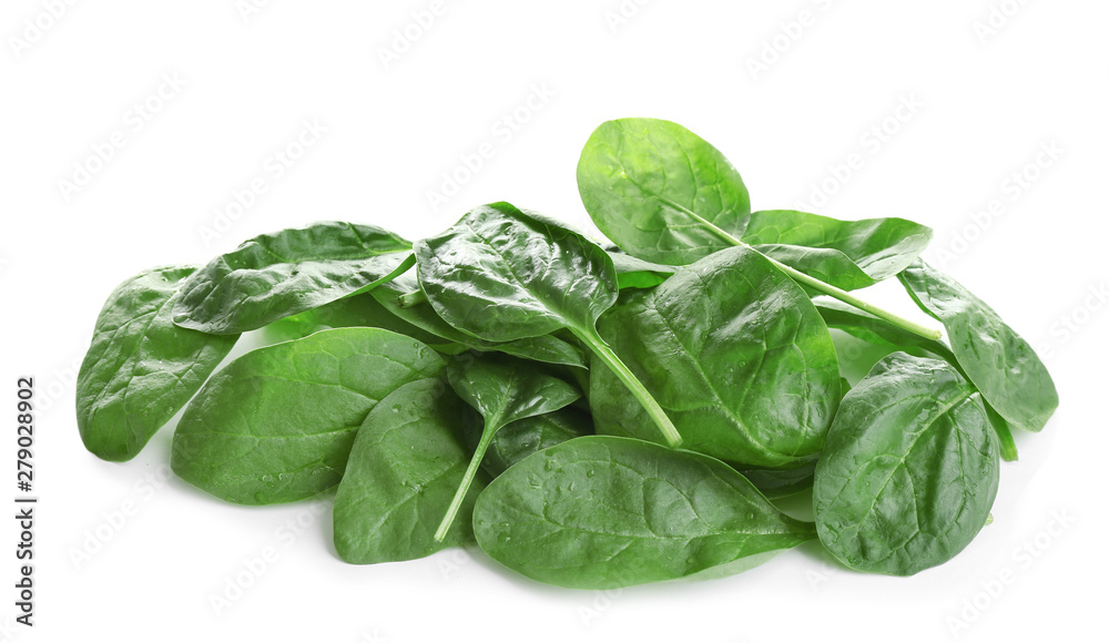 Heap of fresh green healthy baby spinach leaves isolated on white Heap of fresh green healthy baby spinach leaves isolated on white