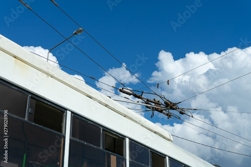 Overhead catenary, part of overhead line equipment of passenger city electric bus. Electrification system