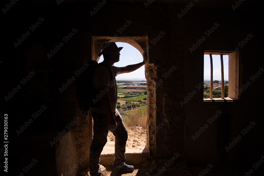Fototapeta premium backpacker traveler with hat and white shirt